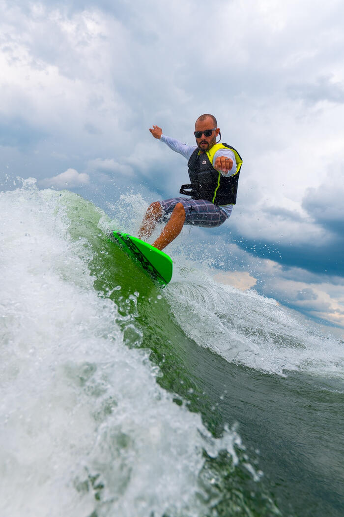 Action sports photography - wave surfing, live action